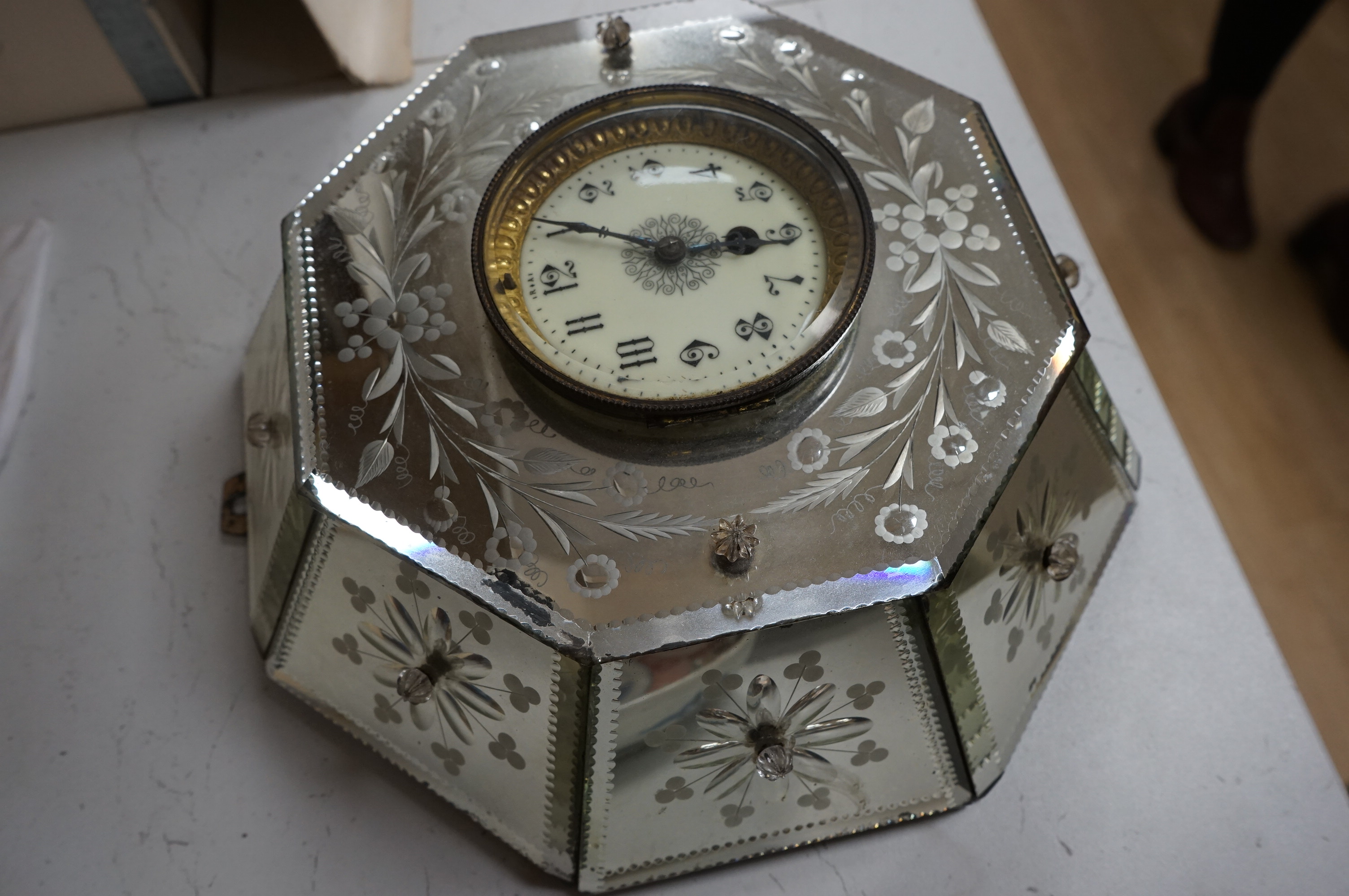 An early 20th century Venetian wheel engraved and mirrored glass octagonal wall clock, 30cm. Condition - fair to good, not tested